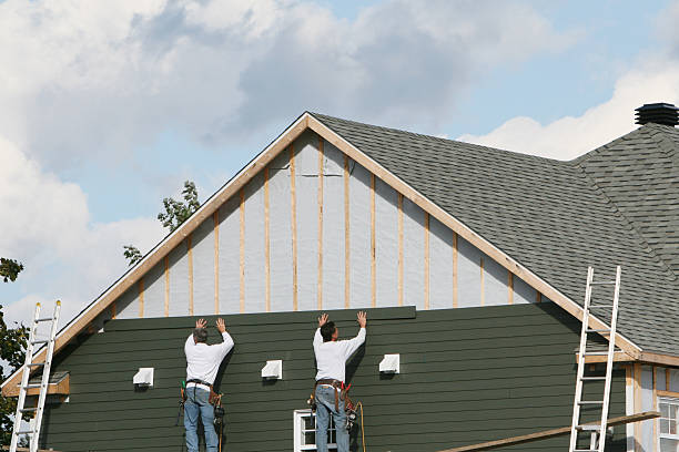 Professional Siding Contractor technician working in Glencoe, MN
